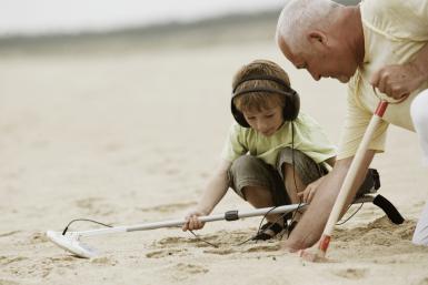 Metal detecting on the beach