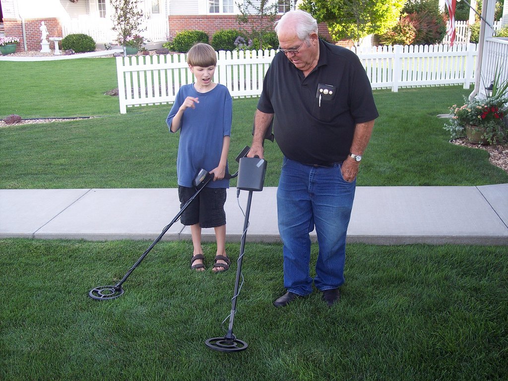 Practicing metal detecting in a yard